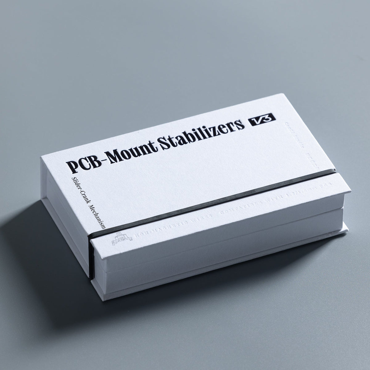 Verpackung der ConSi Studio PCB-Mount Stabilizers V3, weiße Box mit Aufschrift Slider-Crank Mechanism