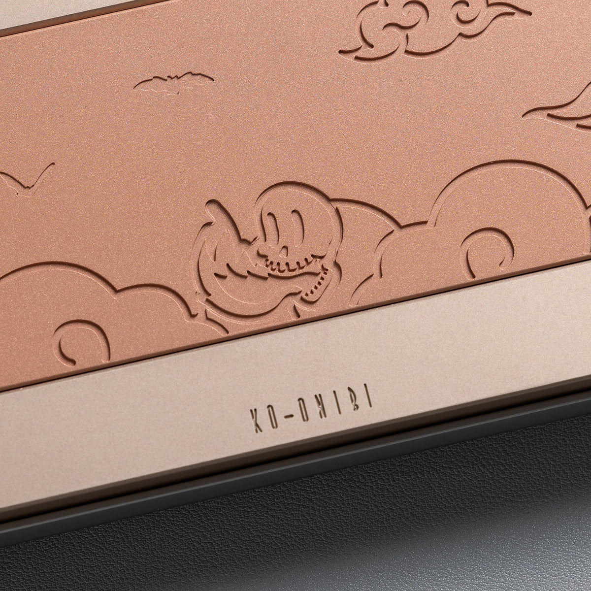 KBDFans KO-Onibi 60% keyboard kit, close-up of the embossed clouds and the KO-ONIBI lettering