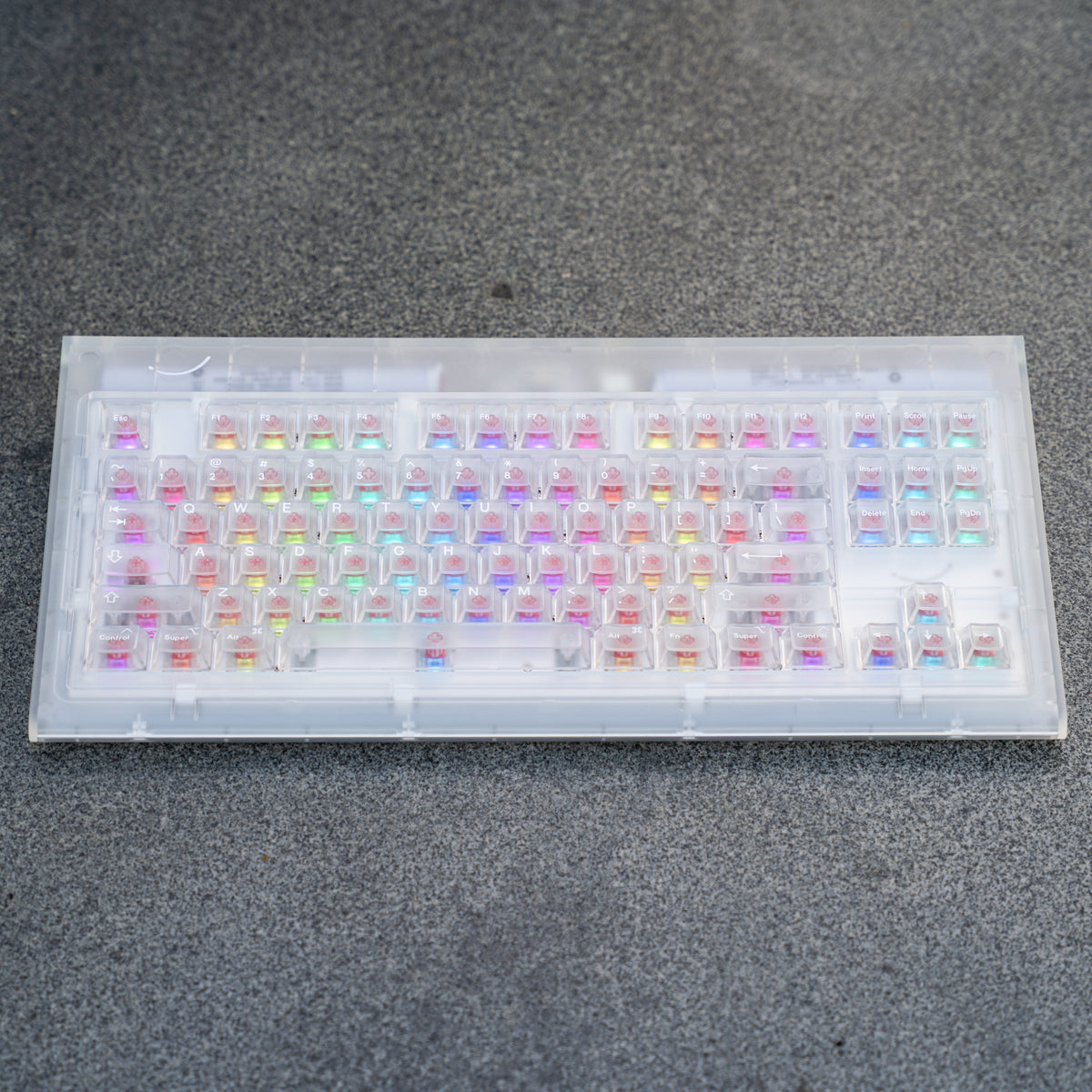 Smurve80 Lume Edition R2 in First Light, 6.25u bottom row with transparent PC keycaps and RGB, top view
