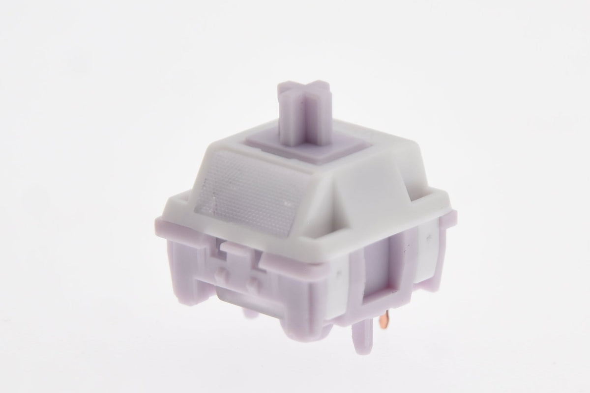 HMX Nono Linear Switch mit fliederfarbenem Stem und Bottom-Housing, weißes Top-Housing mit mattiertem Fenster