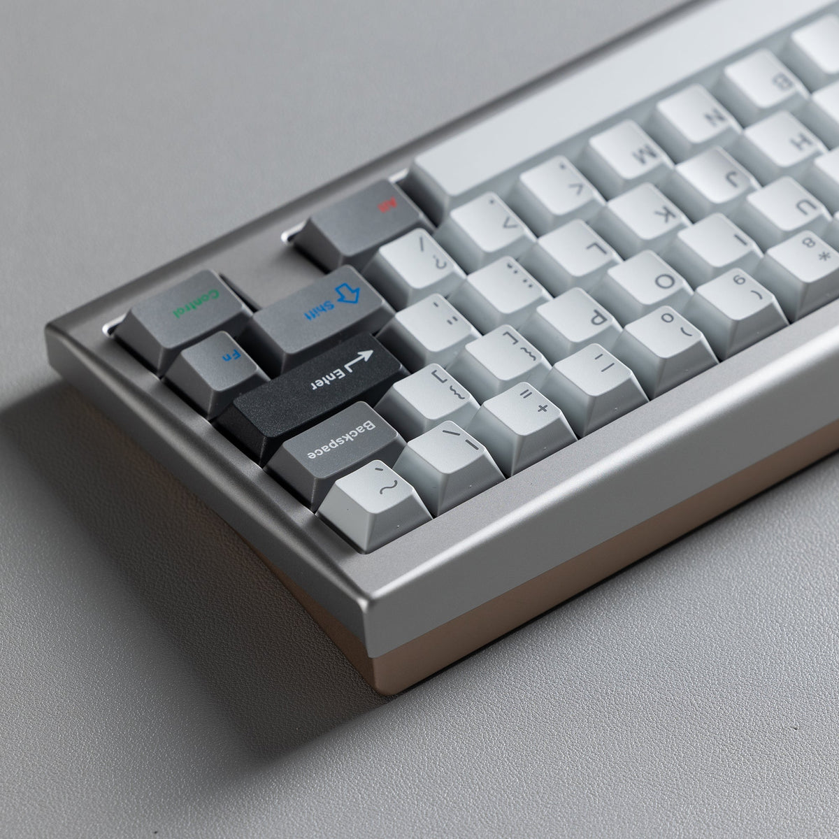 KBDFans KO-Onibi 60% keyboard kit, angled view from the right with arrow keys and modifiers