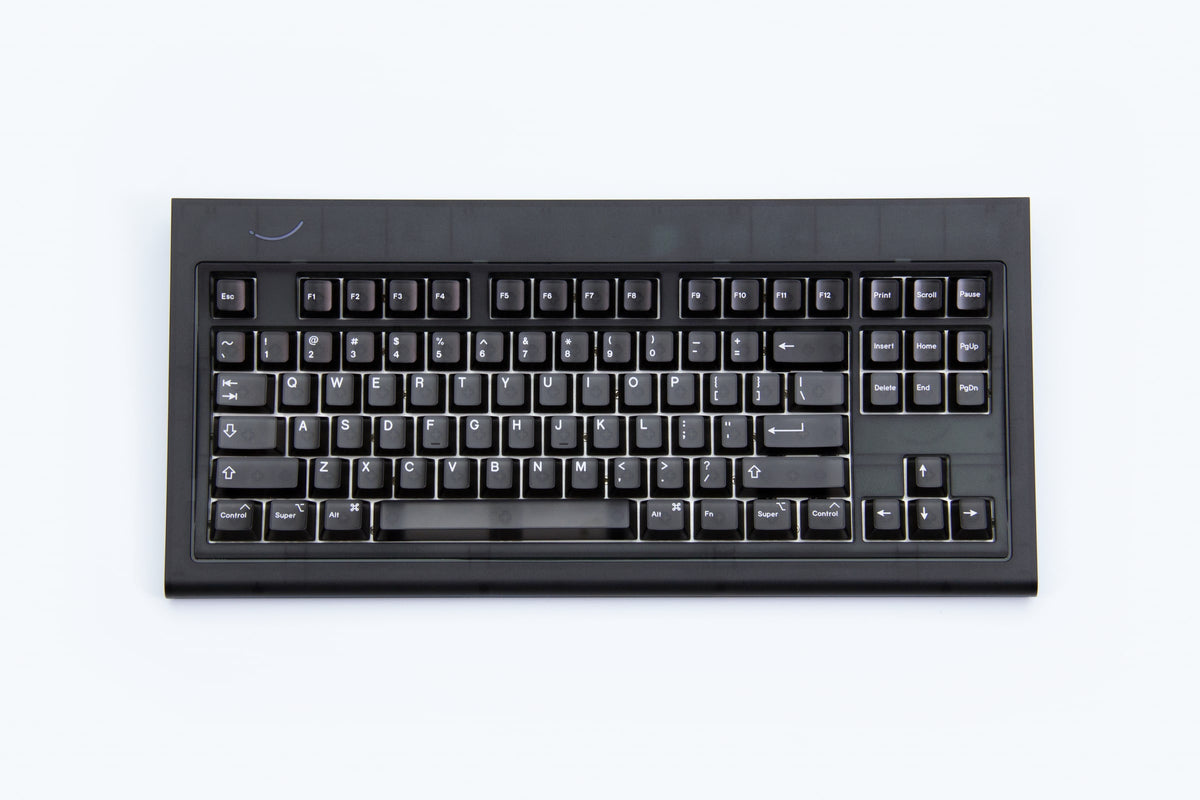 Smurve80 Lume Edition Last Night front view: smoked black case with black keycaps, ANSI